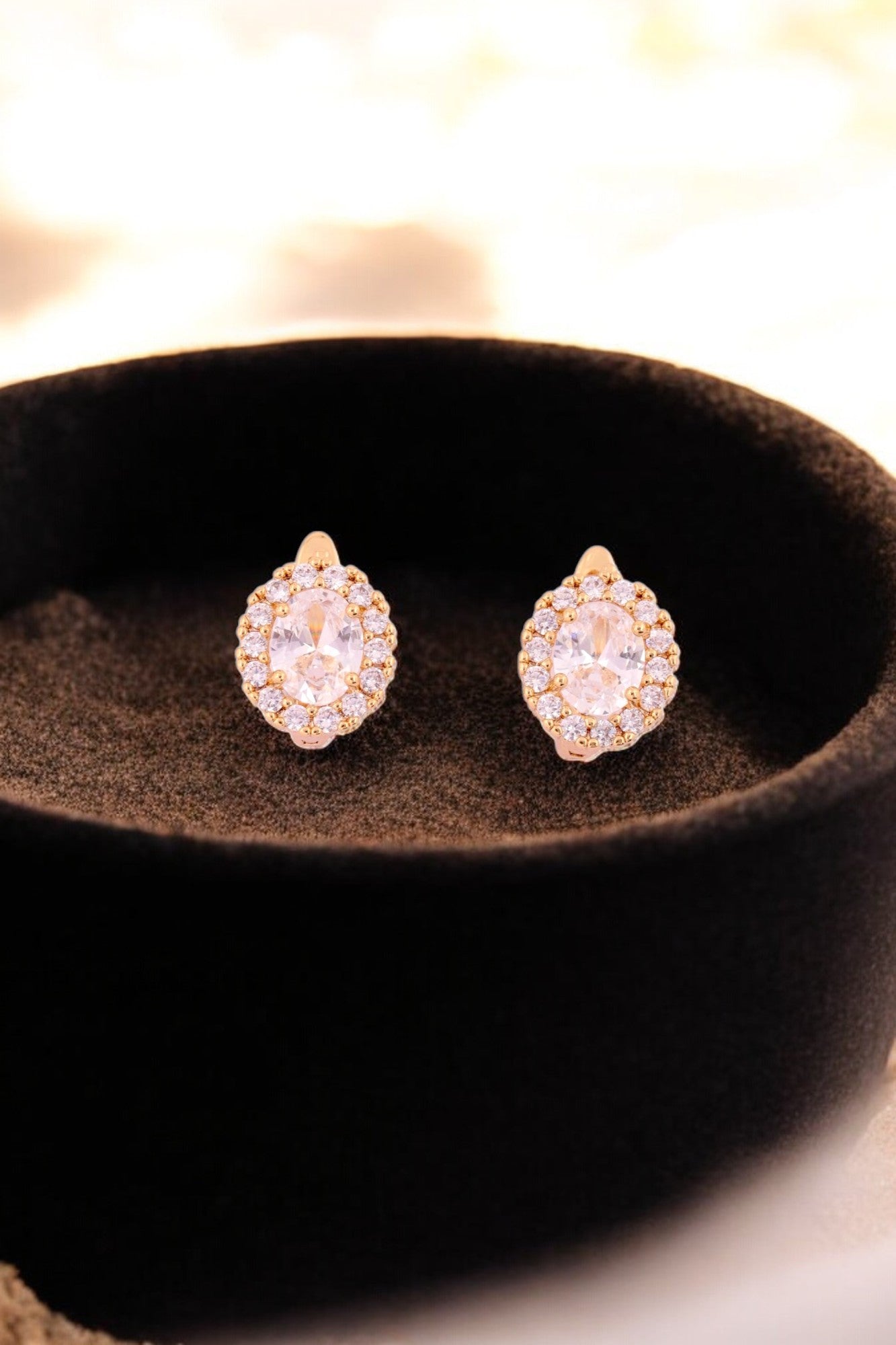Radiant Halo Oval Stud Earrings - Amulya Gems