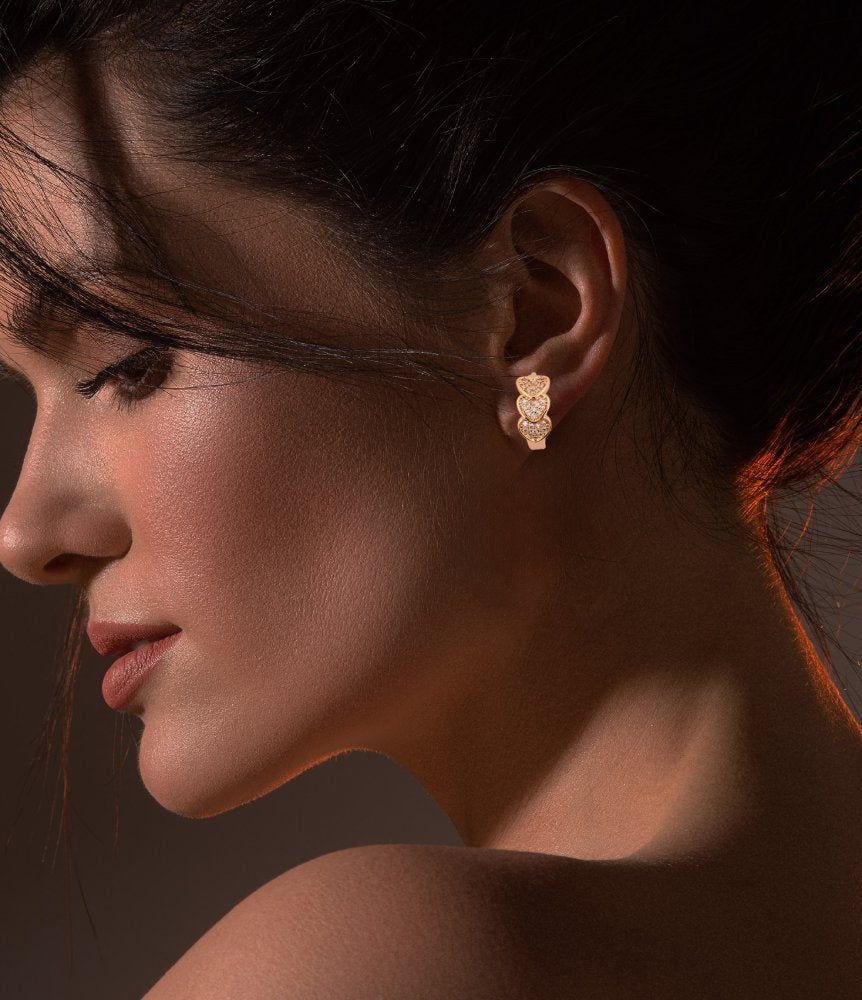 Elegant Gold-Tone Triple Heart Stud Earrings with Crystal Detailing